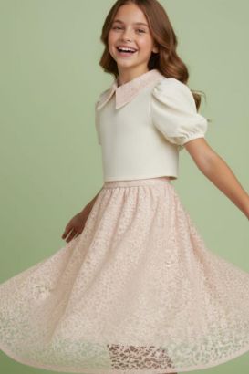 صورة طقم تيور الانيق بياقة مطرزة وتنورة دانتيل كلوش